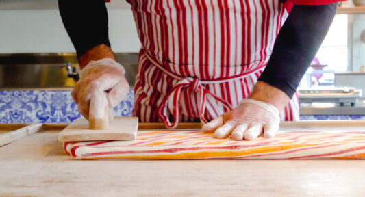 Peppermint candy. Chef making traditional holiday peppermint candies. Close up process