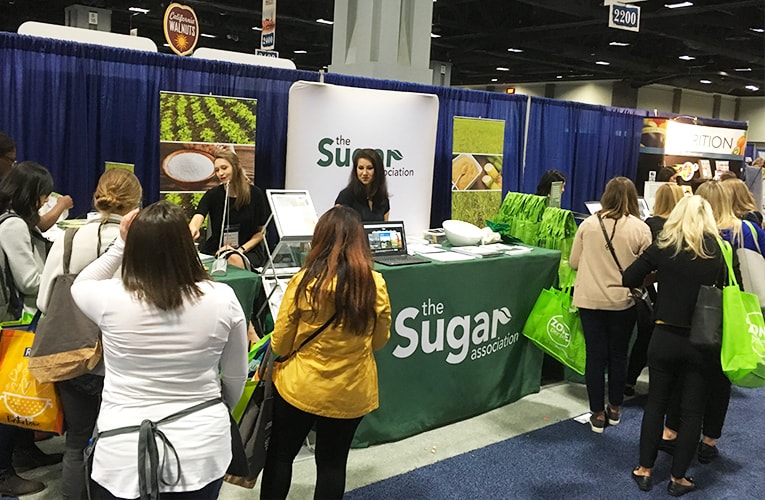 sugar association sharing knowledge at conferences