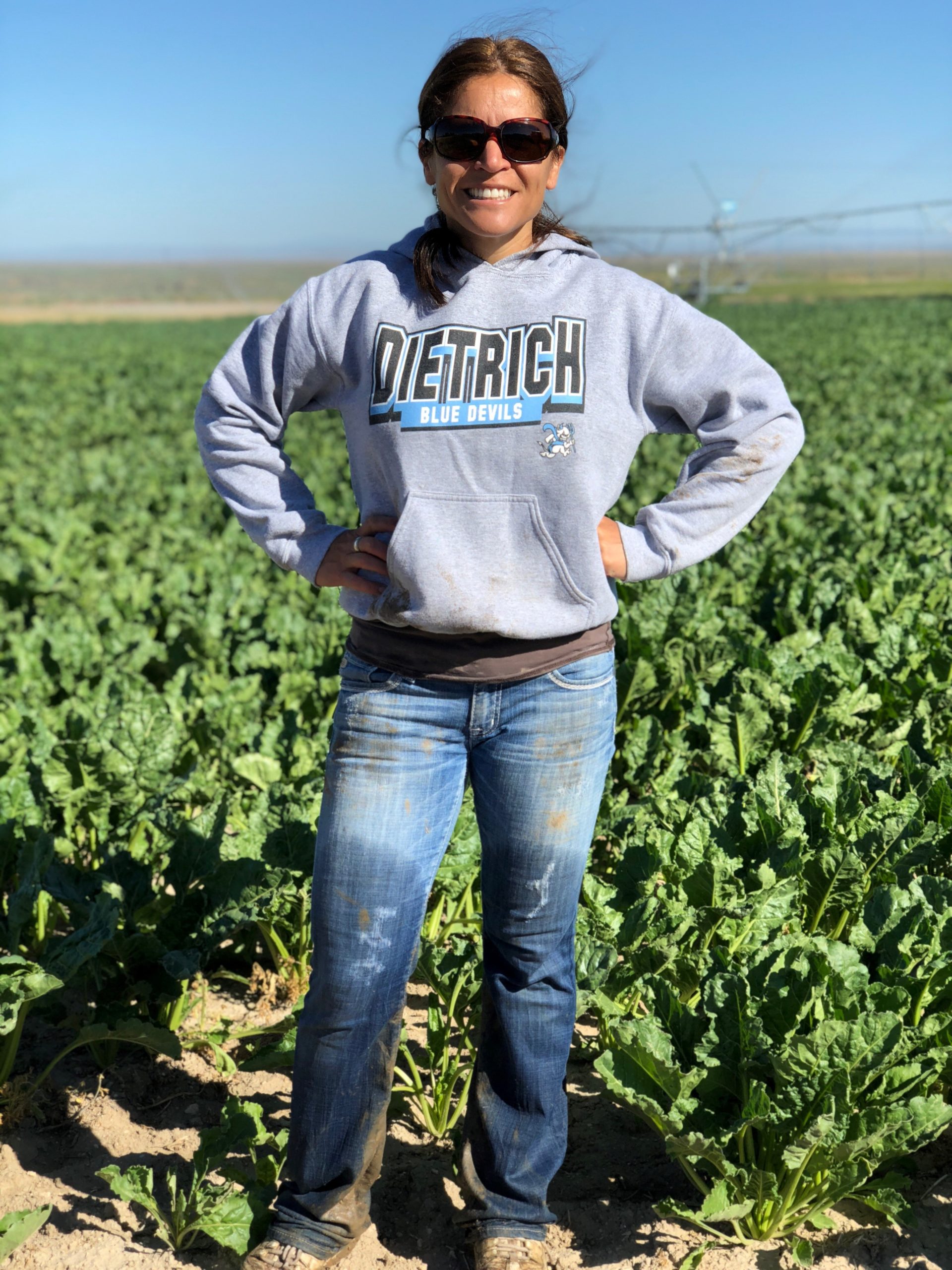 Mindy after helping the kids move their hand lines (irrigation) in their beet shares.